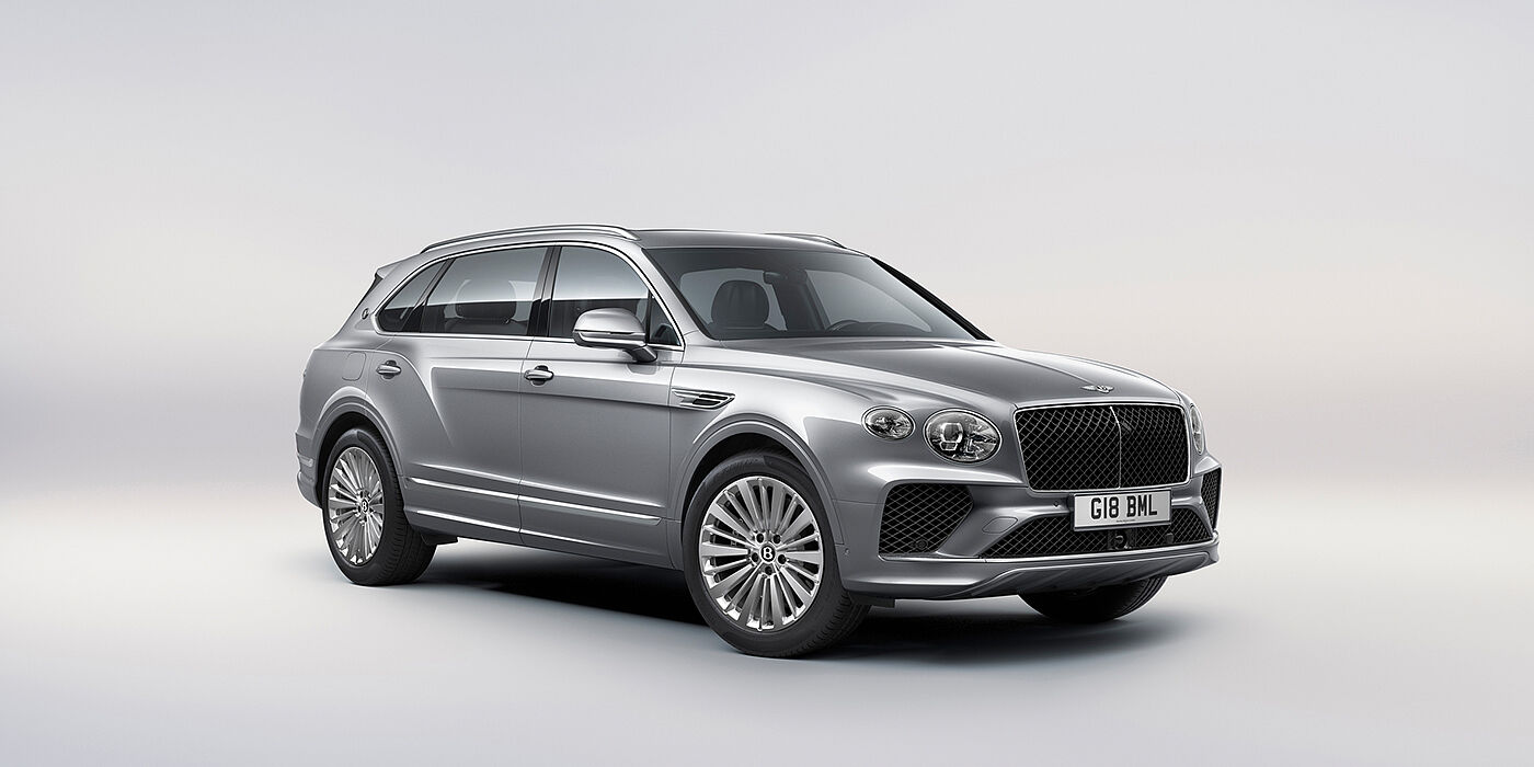 Bentley Edinburgh Bentley Bentayga Extended Wheelbase luxury SUV front three quarter view in Moonbeam paint with 21 inch five spoke painted wheels