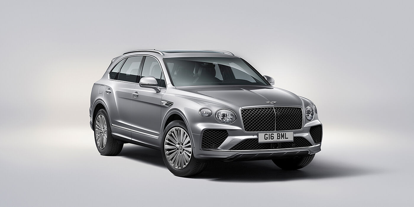 Bentley Edinburgh Bentley Bentayga luxury SUV front three quarter view in Moonbeam paint with matrix grille and 21″ 5 spoke painted wheels