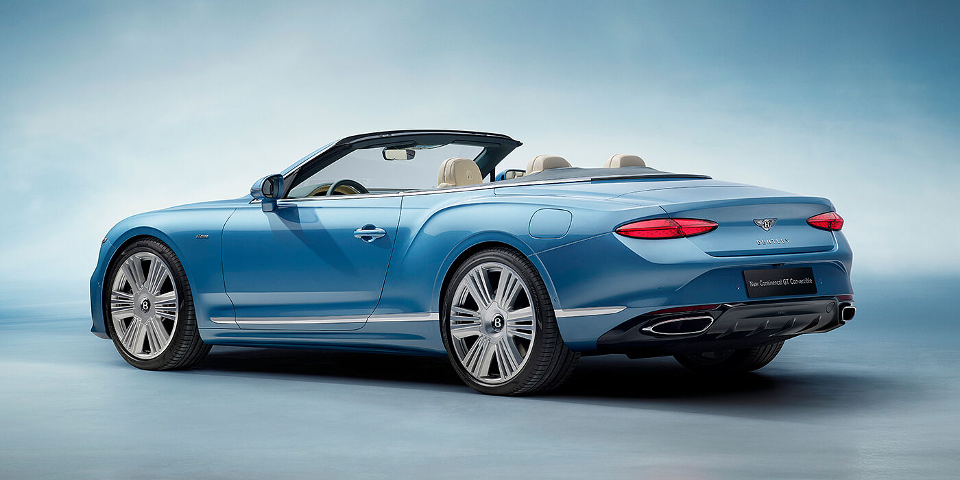 Bentley Edinburgh New Bentley Continental GTC Azure convertible rear view in Light Windsor blue paint with 22 inch ten spoke wheels and chrome exterior details
