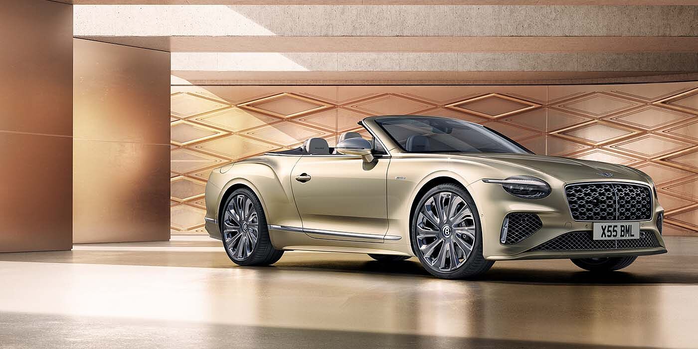 Bentley Edinburgh Bentley New Continental GTC Mulliner V8 hybrid front three quarters in Patina paint