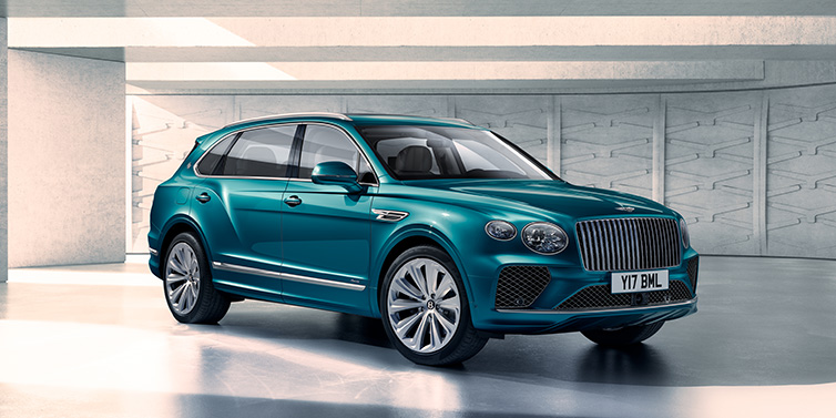 Bentley Edinburgh Bentley Bentayga Extended Wheelbase Azure SUV front three quarter in Topaz blue paint colour with a grey background