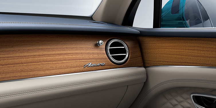 Bentley Edinburgh Bentley Bentayga Extended Wheelbase Azure front dash showing Open Pore Koa veneer surrounded by Portland and Imperial Blue hides