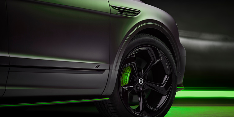 Bentley Edinburgh Bentley Bentayga S Black Edition SUV exterior wheel detail with Cyber Green brakes with Anthracite Satin paint